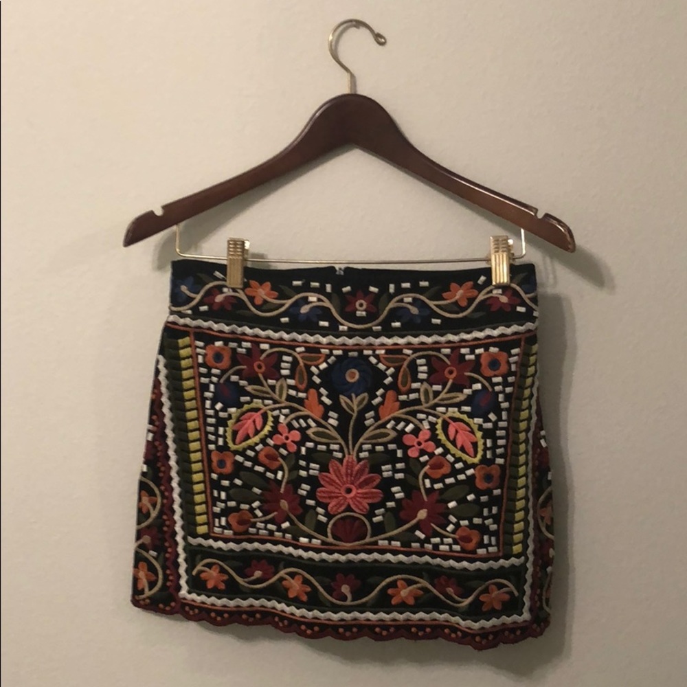 Embellished mini skirt.